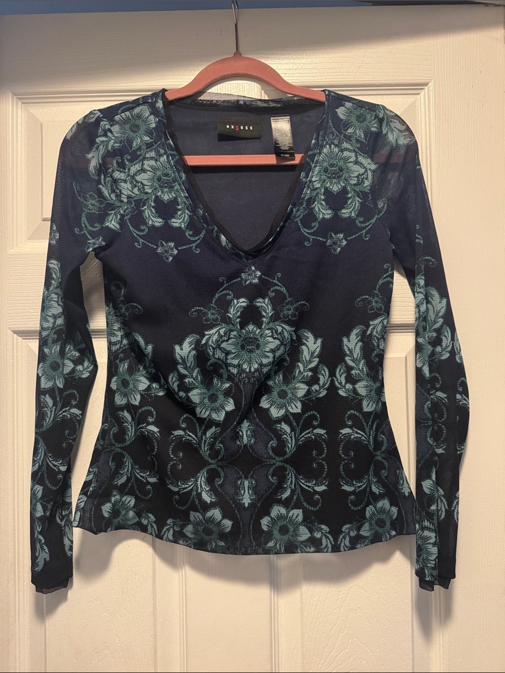 Sheer sleeved top with whimsical designs